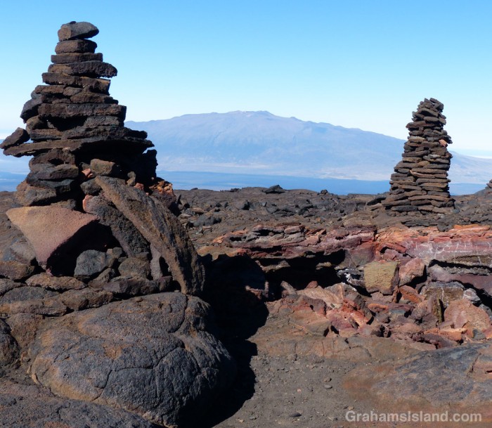 These two big cairns mark a collapsed lava tube.
