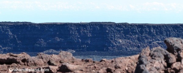 Mauna Loa cabin can be seen across the crater.