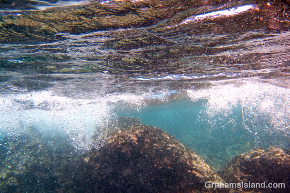 Colors and patterns of the surface of the water from below.