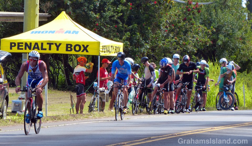 IRONMAN competitors pull over to wait out time penalties they’ve been given by race marshals