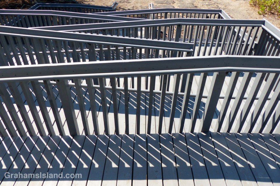 Light and shadows made by the long and winding ramp to an elevated restroom