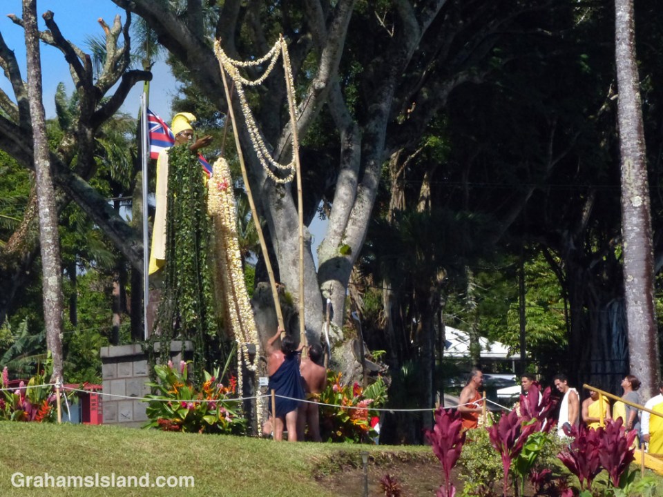 A lei is draped over the spear of the statue of King Kamehameha 1 in Kapaau