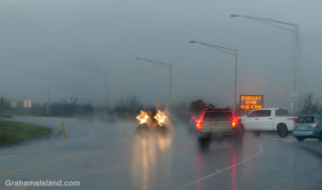 In Kailua Kona, this electronic sign flashes “Emergency Water Restriction” and “Stop Sprinkler Use.”