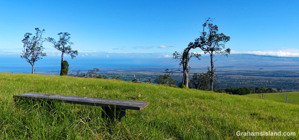This bench is one of two on the summit of Puu Waawaa, and this is the view looking north toward the coast and the Kohala mountains.
