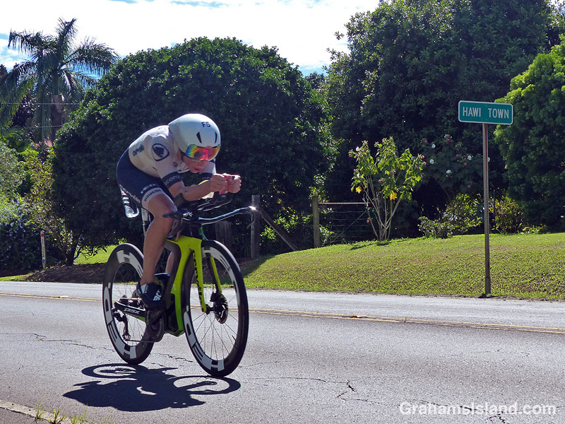 Ironman cyclist leaving Hawi