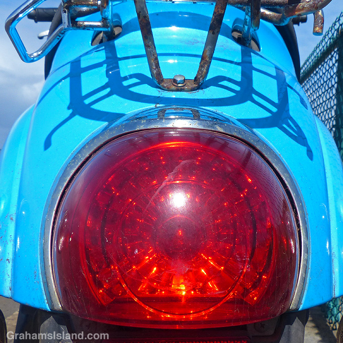 A close up of taillight of a Honda Metropolitanscooter
