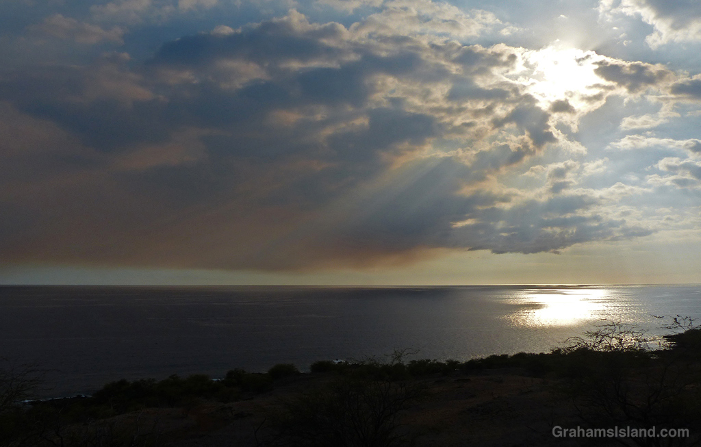Smoke hangs in the sky off the Kohala Coast Hawaii