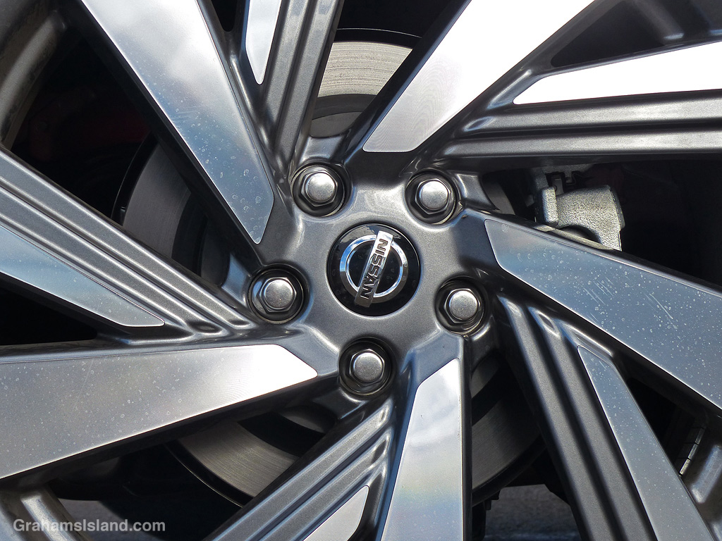 A close up of an auto wheel