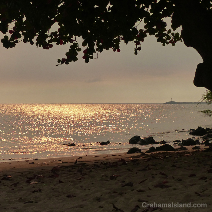 Smoky skies cause golden light on the waters of Hawaii