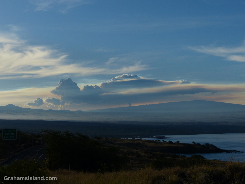 A cloud forms over the site of the eruption on Mauna Loa , Hawaii