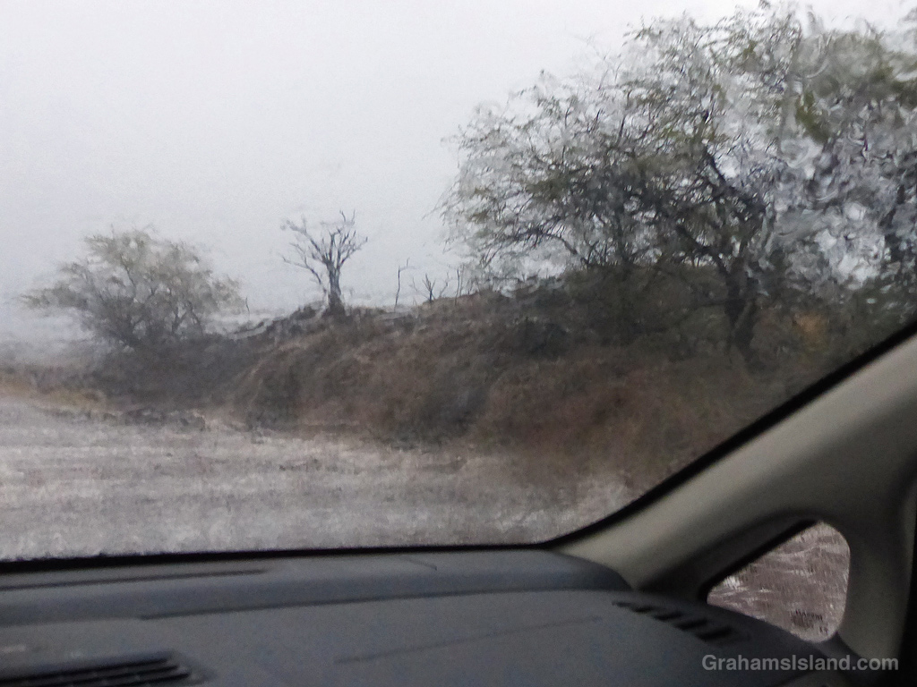 Heavy rains flood a road on the Big Island, Hawaii