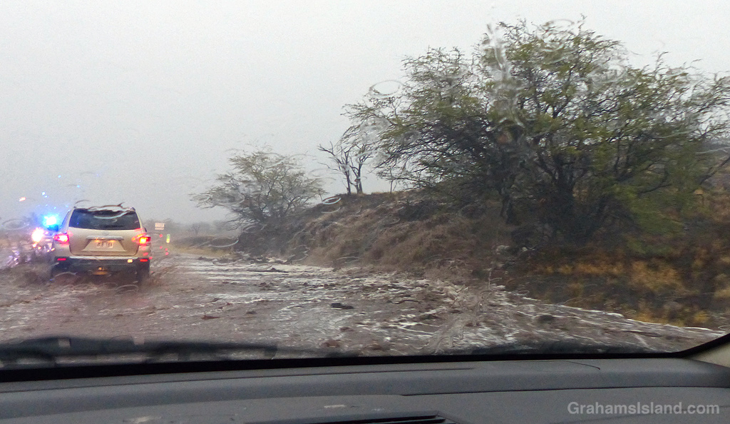 Heavy rains flood a road on the Big Island, Hawaii