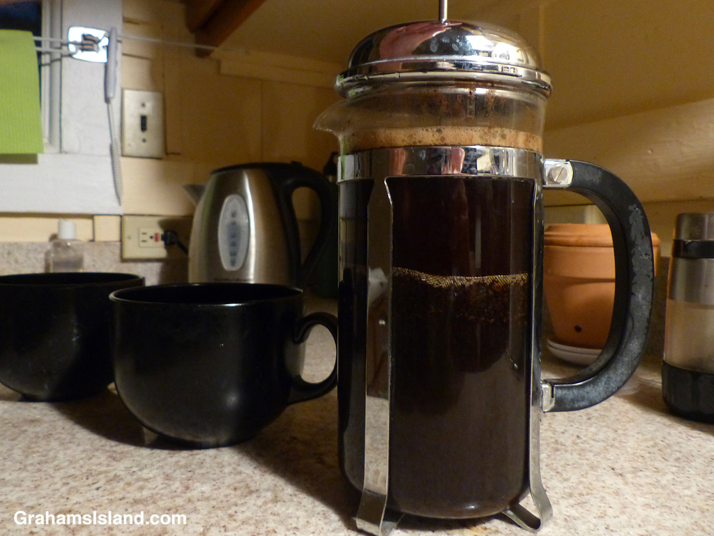Morning coffee being made with a French press
