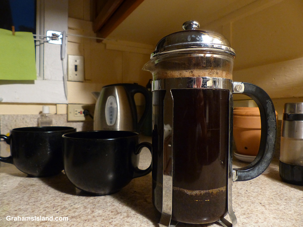 Morning coffee being made with a French press