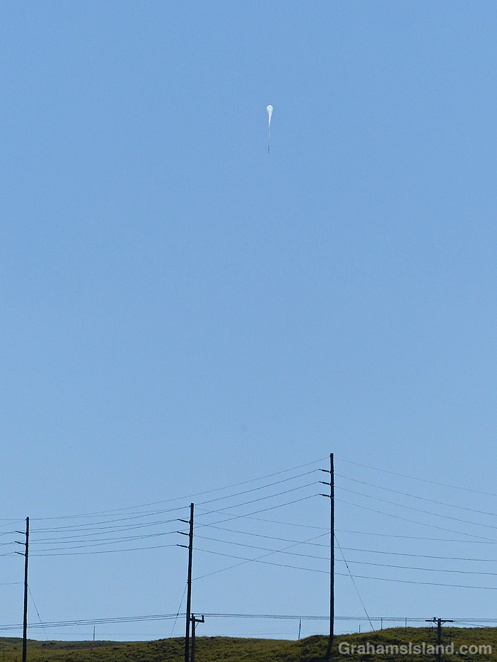 A scientific balloon rises over the Big Island, Hawaii