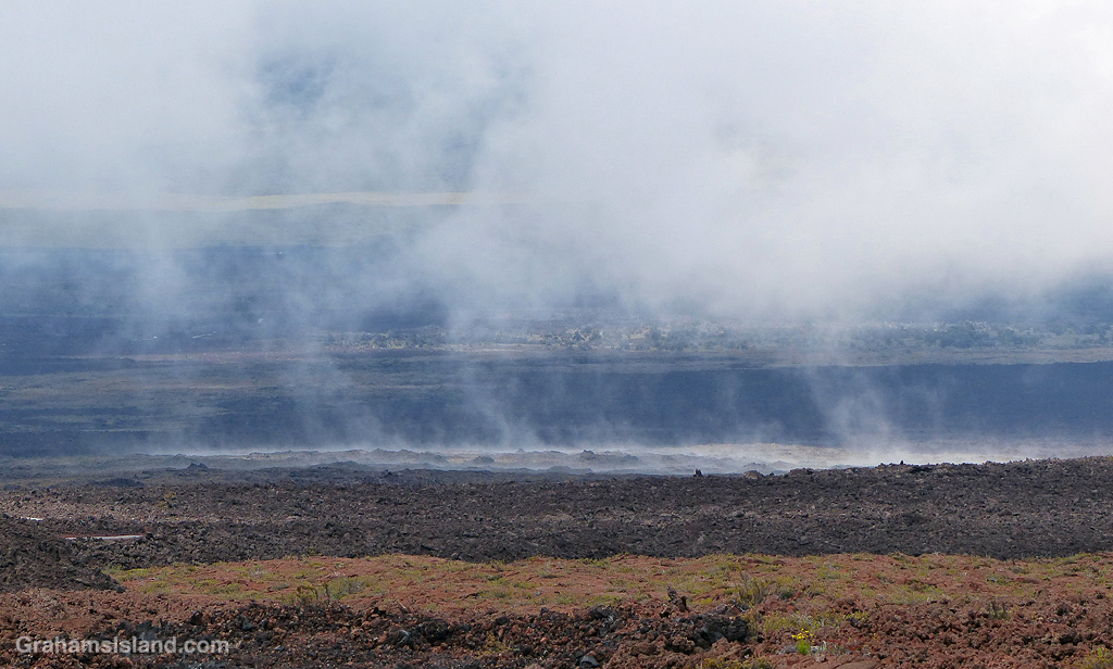 Clouds meet the and on the saddle between Mauna Loa and Mauna Kea in Hawaii
