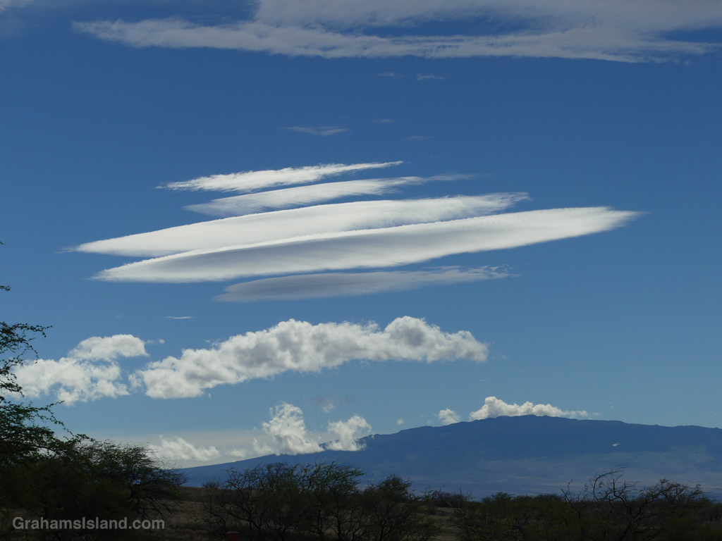 Lenticular clouds over Hualalai Volcano in Hawaii