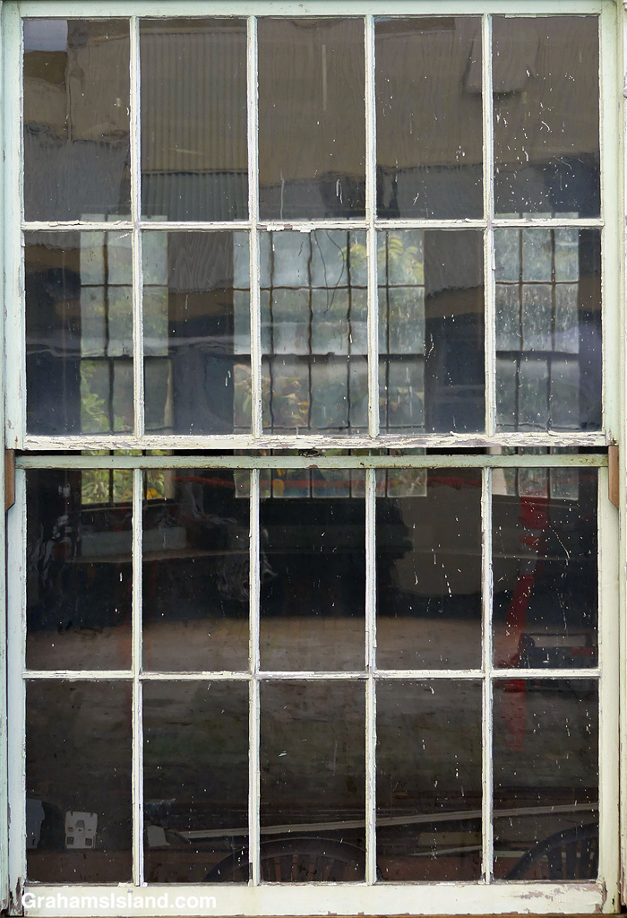 A view through a window at the old Bond Library in Kapaau, Hawaii