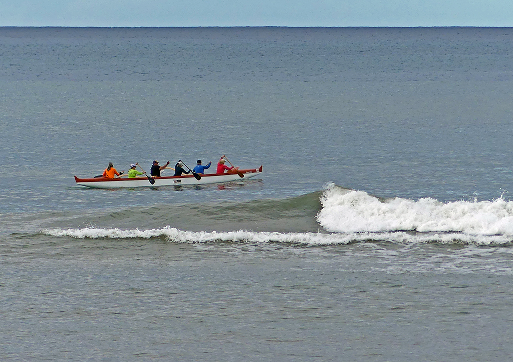 Canoe paddlers practice in the waters off Hawaii
