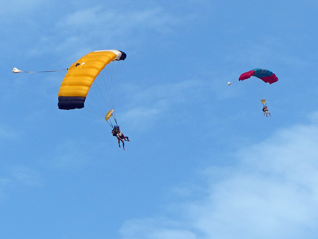 Skydivers in the air above Hawaii