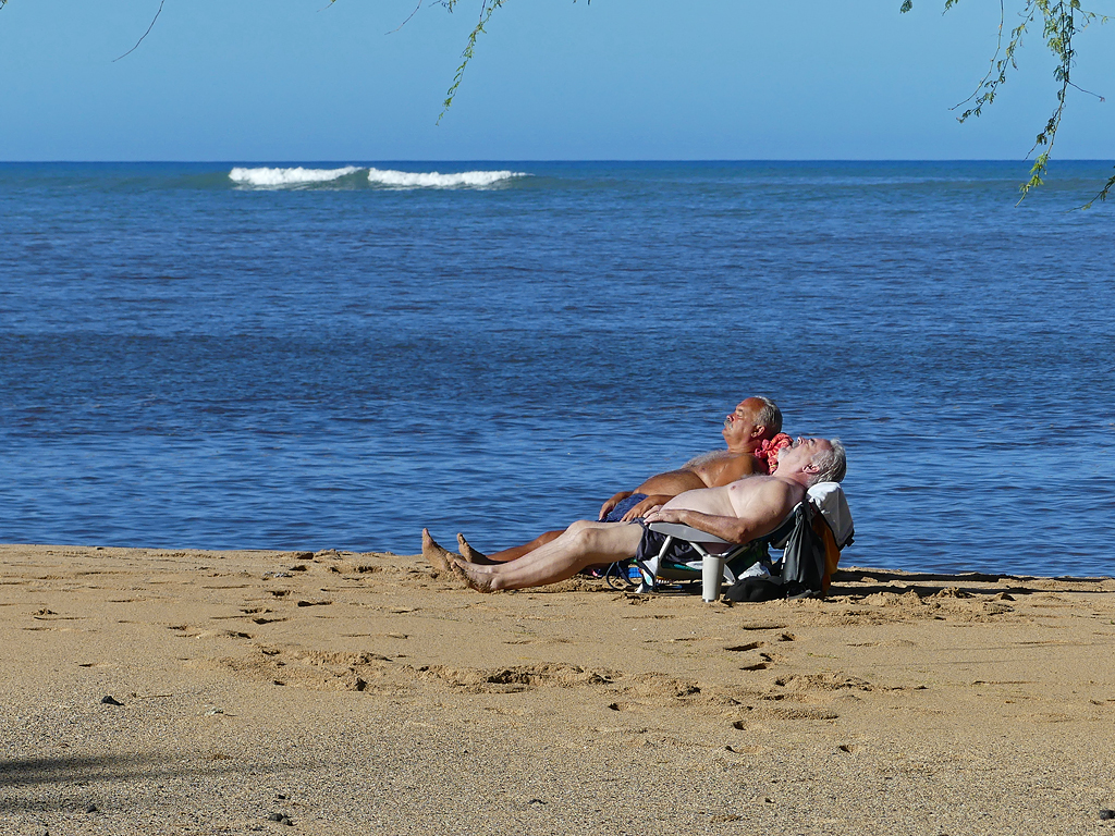 Sunbathing on a beach in Hawaii