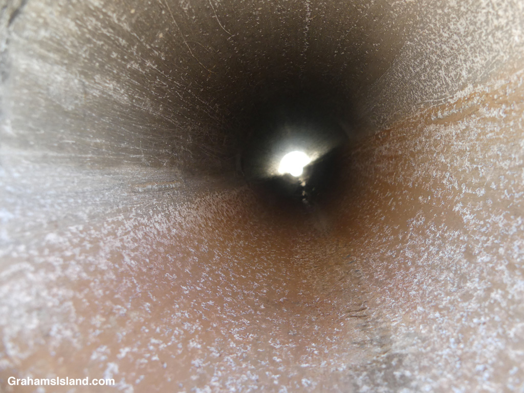 A view down the center of an aluminum tube