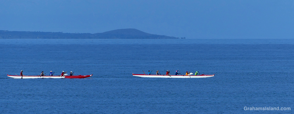 Canoe paddlers practice in the waters off Hawaii