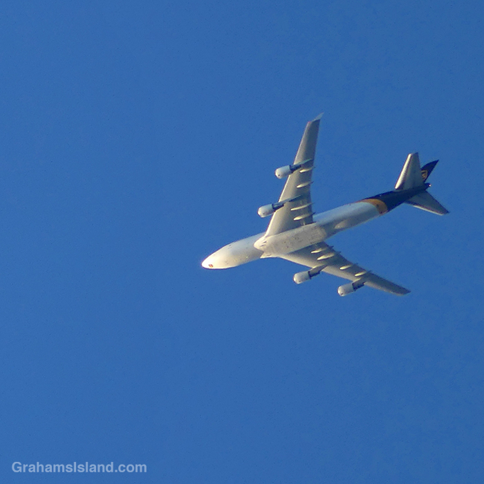 A UPS plane flies overhead in Hawaii