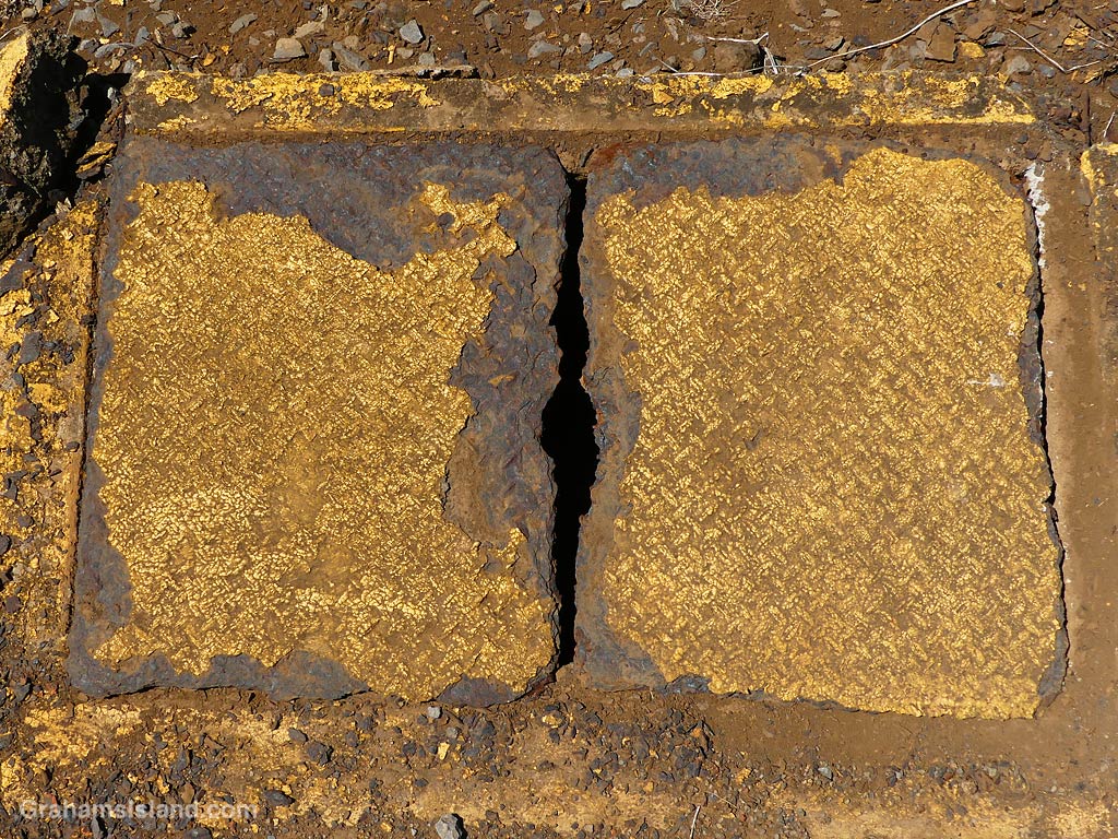 An aging cover over a utilities vault in Hawaii