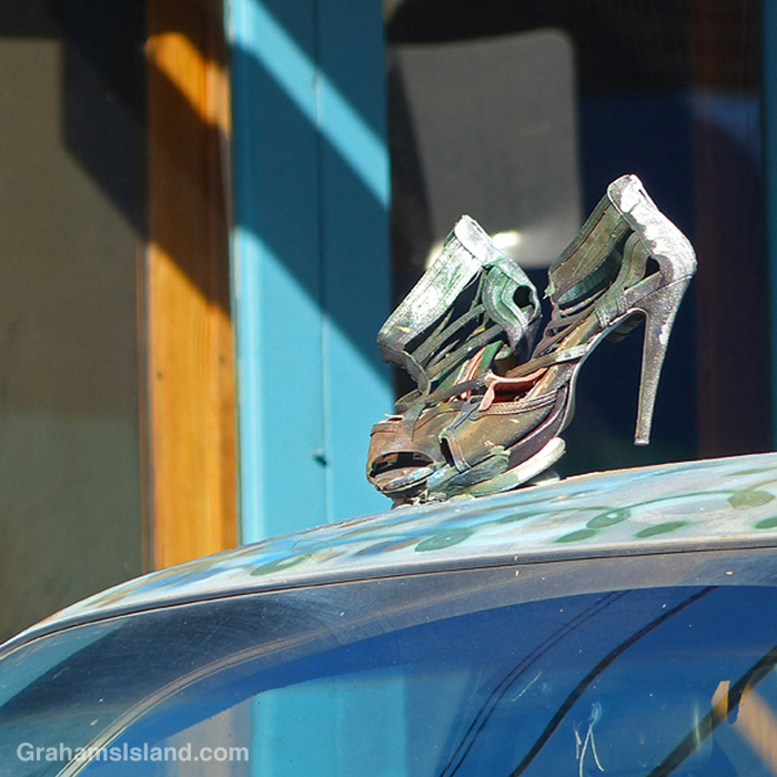 High heels stuck to the roof of a painted truck in Hawaii