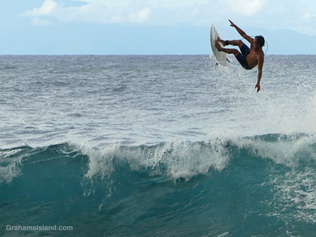 A surfer off Keokea Beach Park, Hawaii