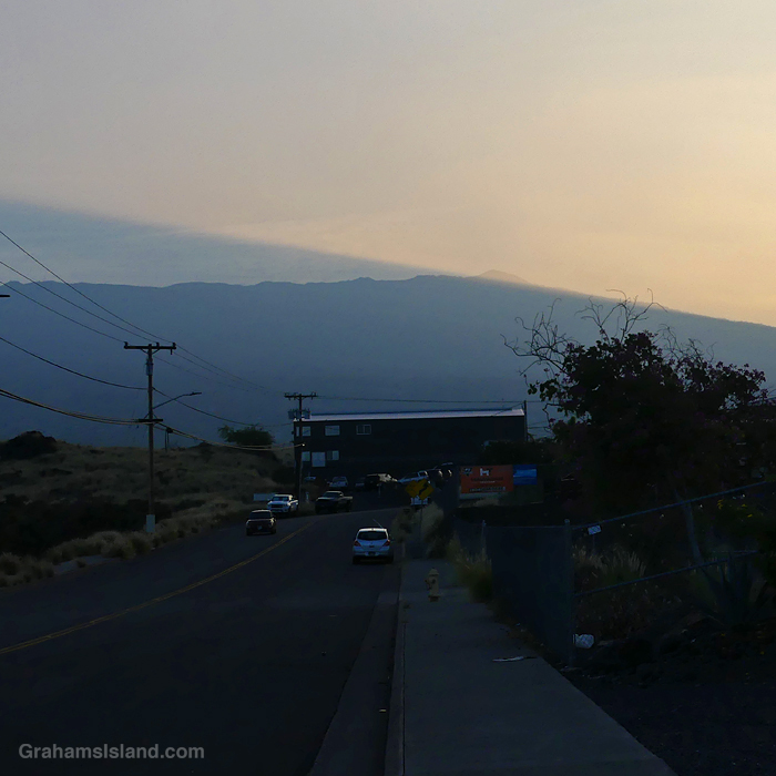 Sunrise illuminating one slope of Hualalai volcano, Hawaii.