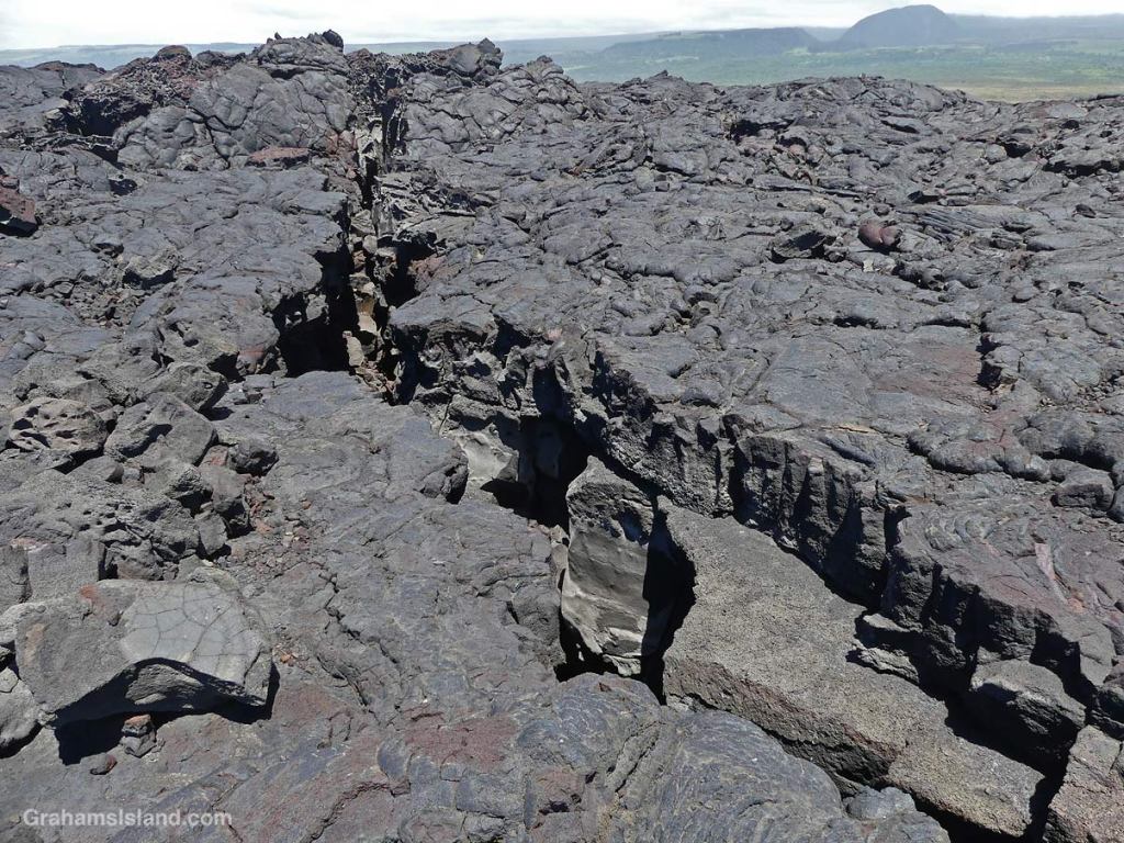 Lava cracks on the trail to Kamehame Beach on the Big Island Hawaii