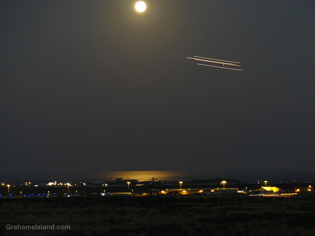 A view of the full moon over Kailua Kona Airport in Hawaii