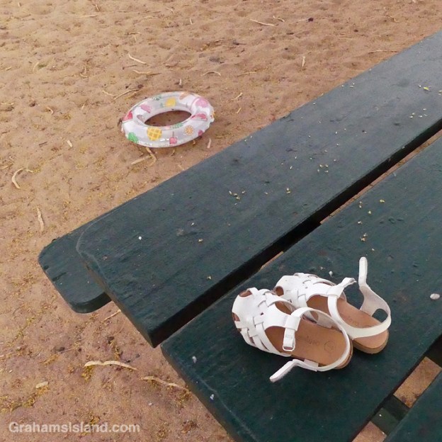 Sandals and a flotation tube at Spencer Beach Park in Hawaii
