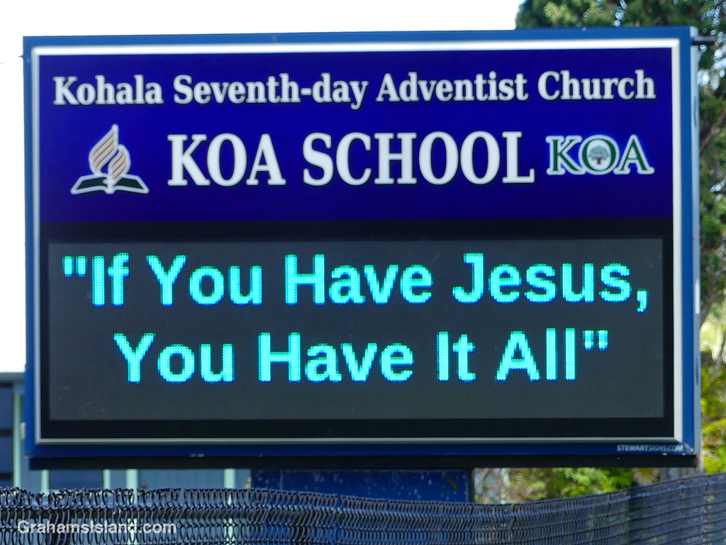 A sign in front of a church in Hawaii
