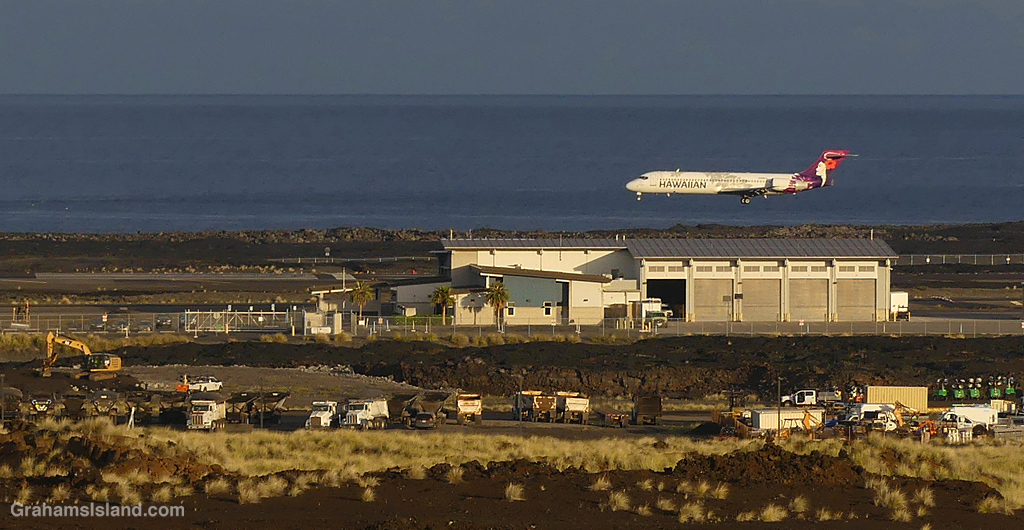 A plane lands at Kailua Kona Airport in Hawaii
