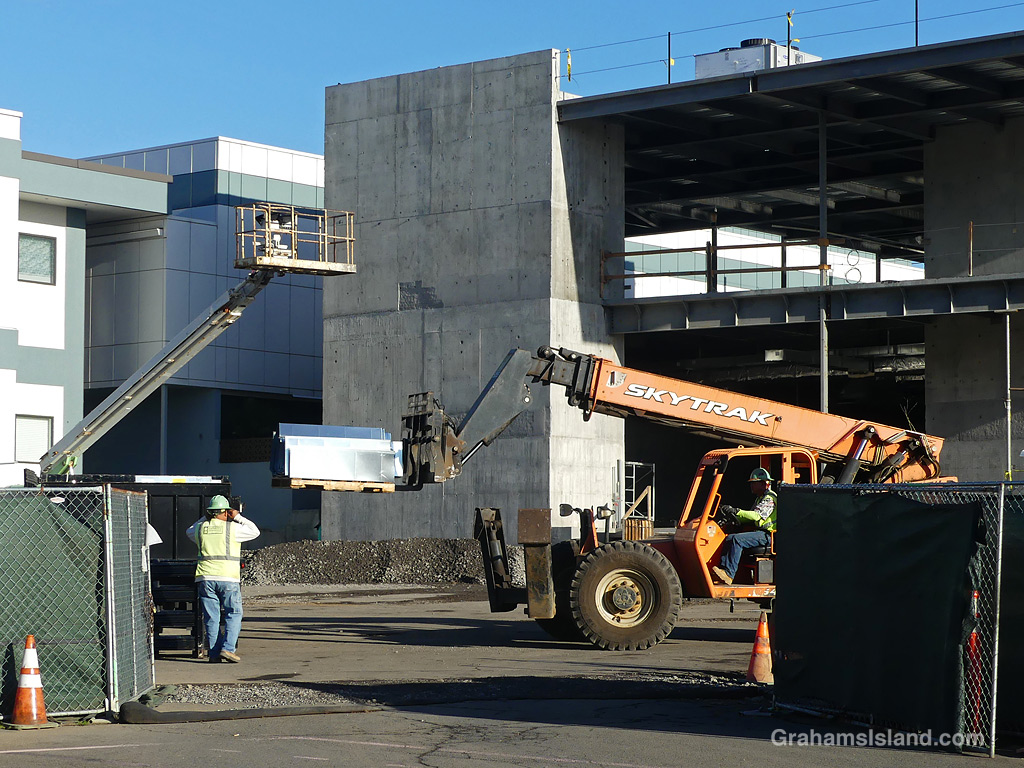 Moving materials at a construction site at Hilo Benioff Medical Center in Hawaii