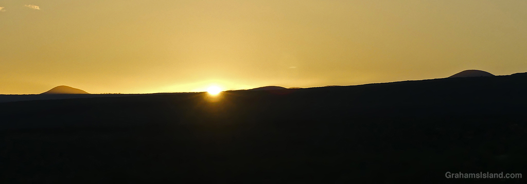 Sunrise over the saddle between Mauna Kea and Kohala Mountain in Hawaii
