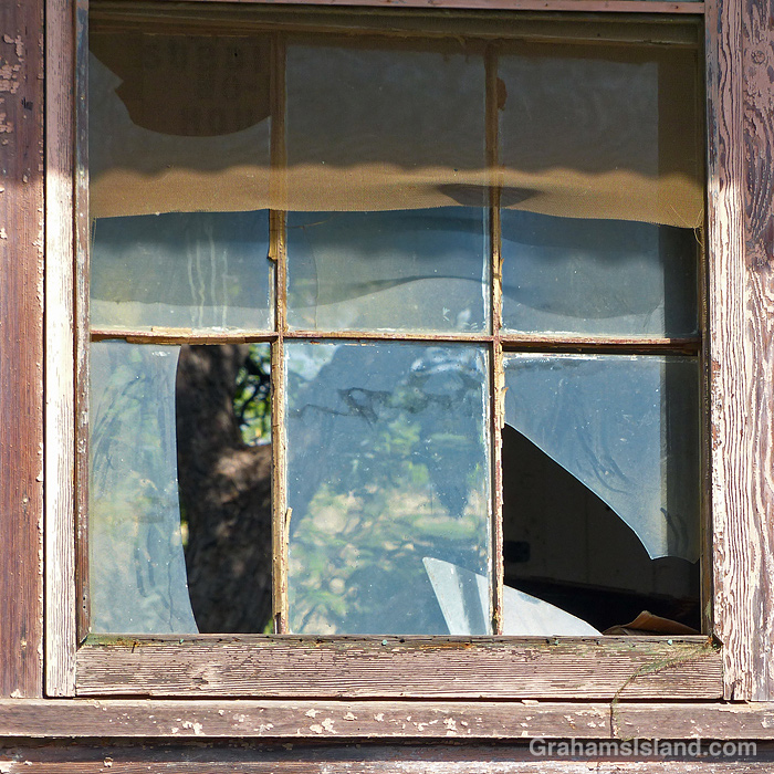 A broken window at Spencer Beach Park, Hawaii