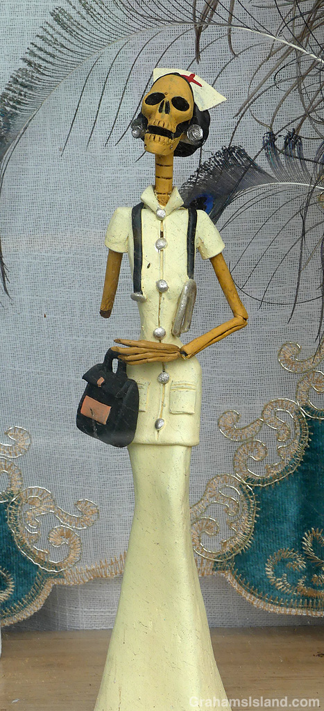 A scary nurse in a Halloween window display