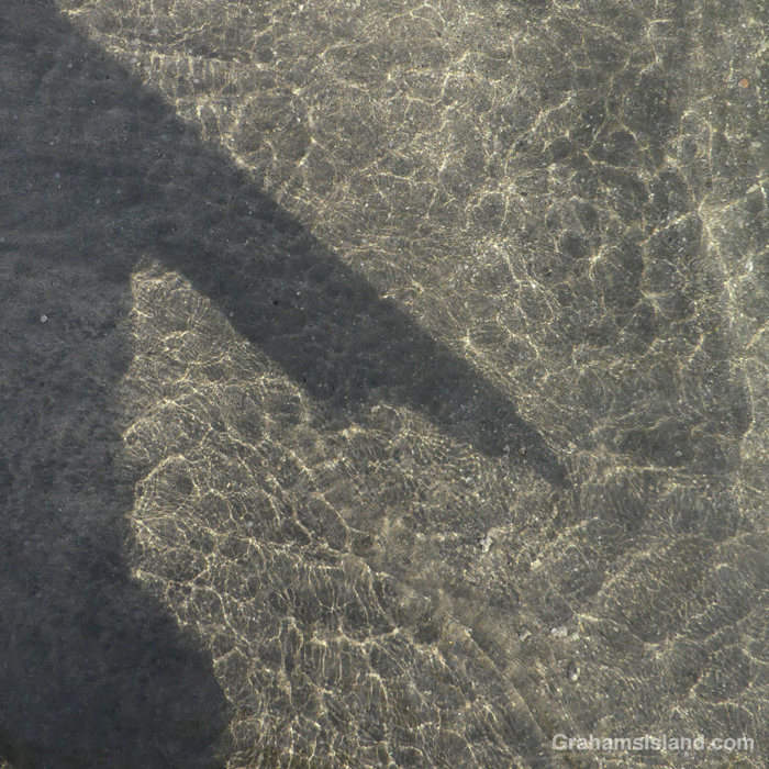 A shadow on the water at Kawaihae Hawaii