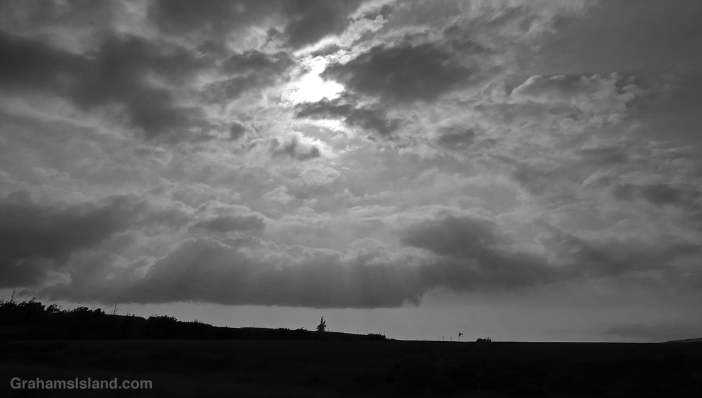 Black and white image of clouds over Upolu Airport in Hawaii