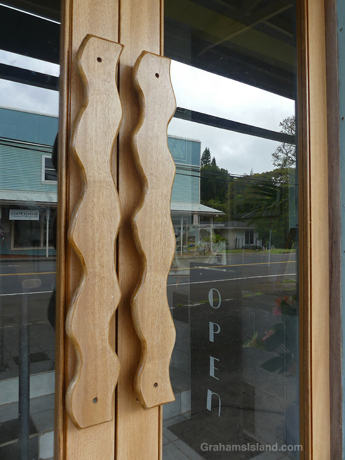 Wooden handles on a door in Kapaau, Hawaii