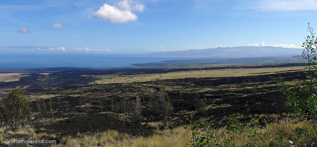 A view from Mamalahoa Highway on the Big Island, Hawaii, with Kohala Mountain and Maui in the background