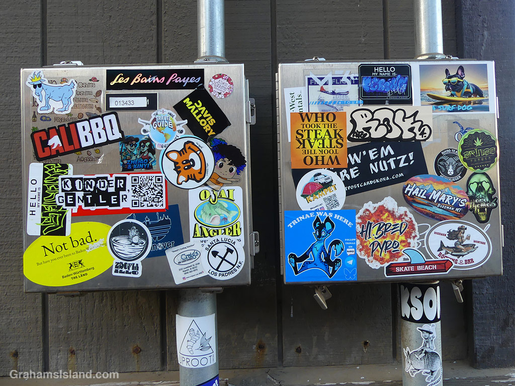 Stickers on utility boxes at Kailua Kona airport in Hawaii