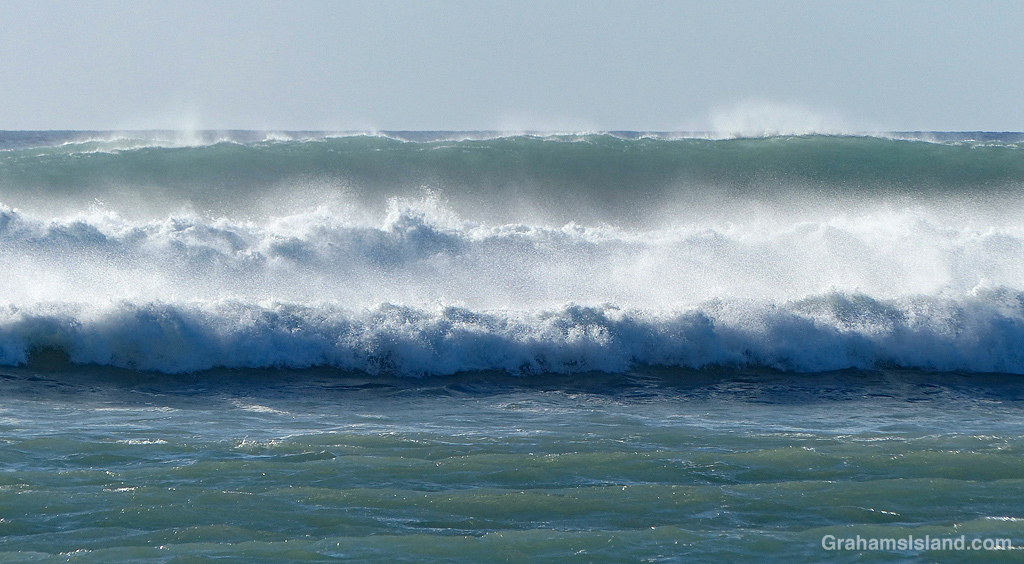 Surf rolls in at Kawaihae, Hawaii