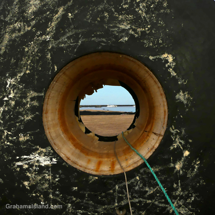 A View through a buoy on the beach at Kawaihae, Hawaii