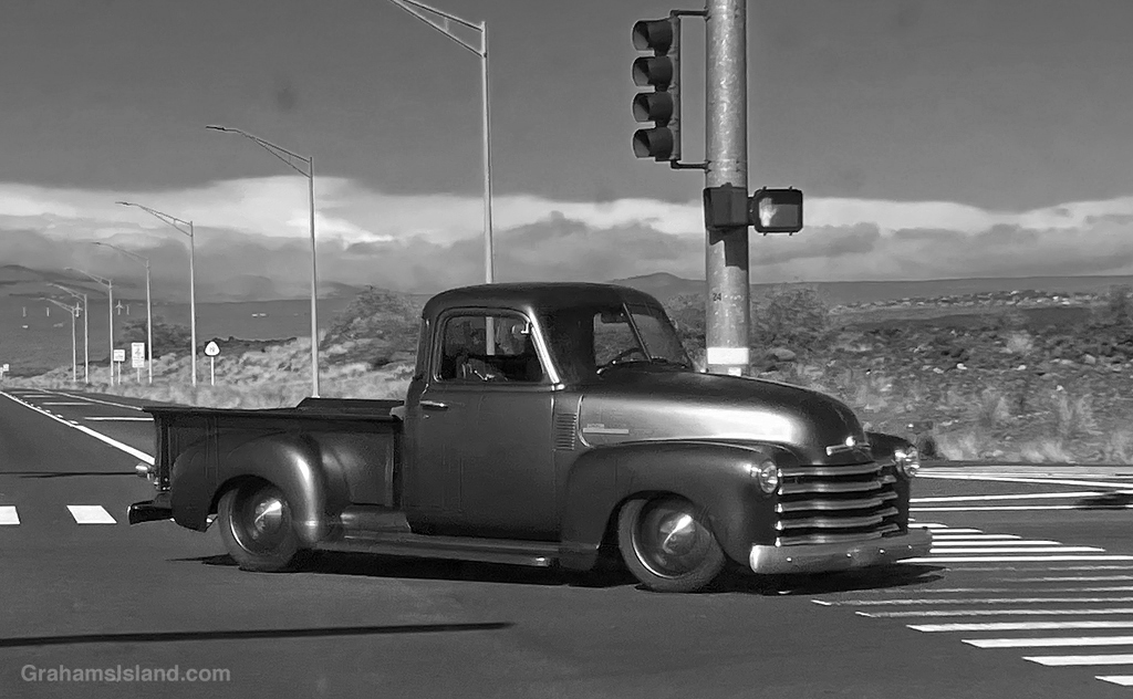 An old truck in a black and white image in Hawaii