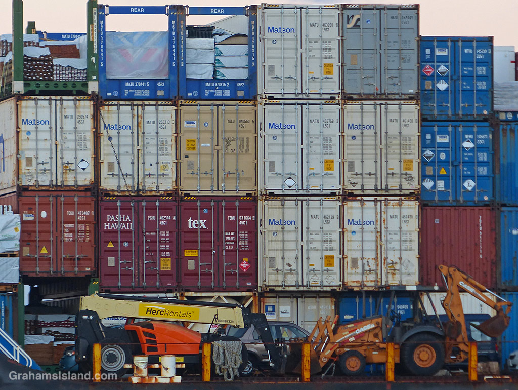 Containers on a barge entering Kawaihae Harbor in Hawaii